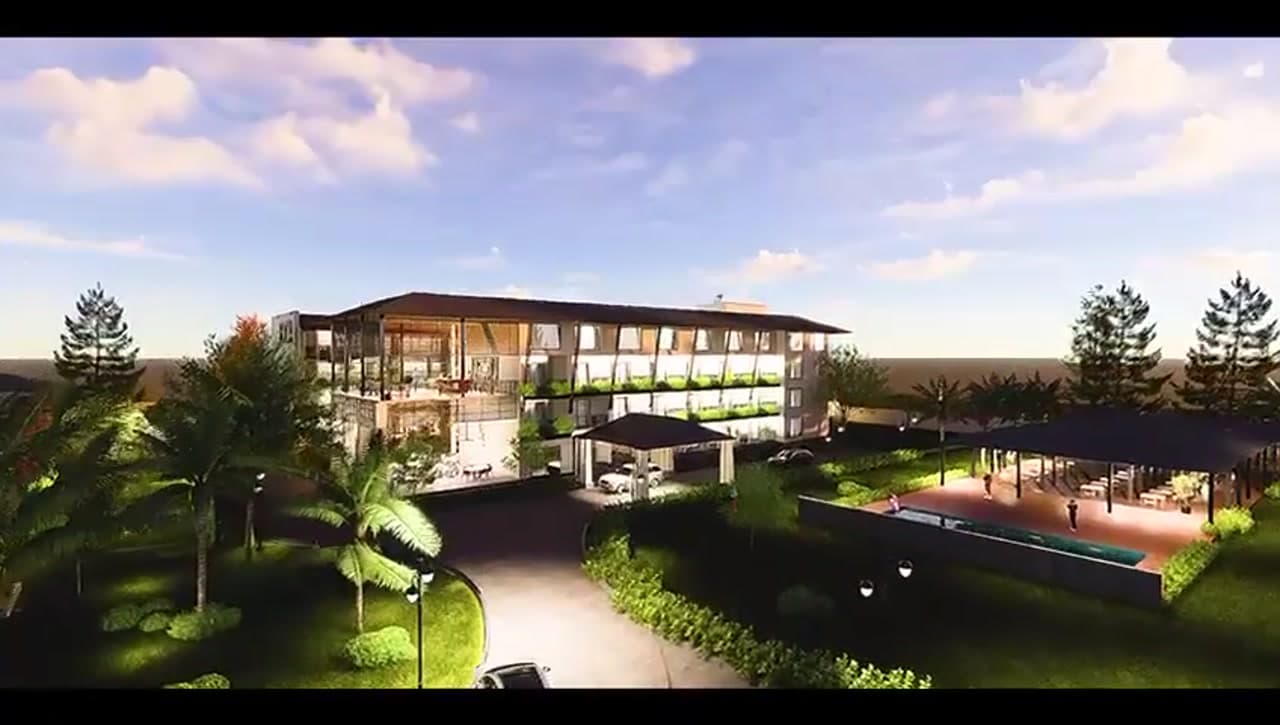 Aerial view of pool area and rooftop sky lounge