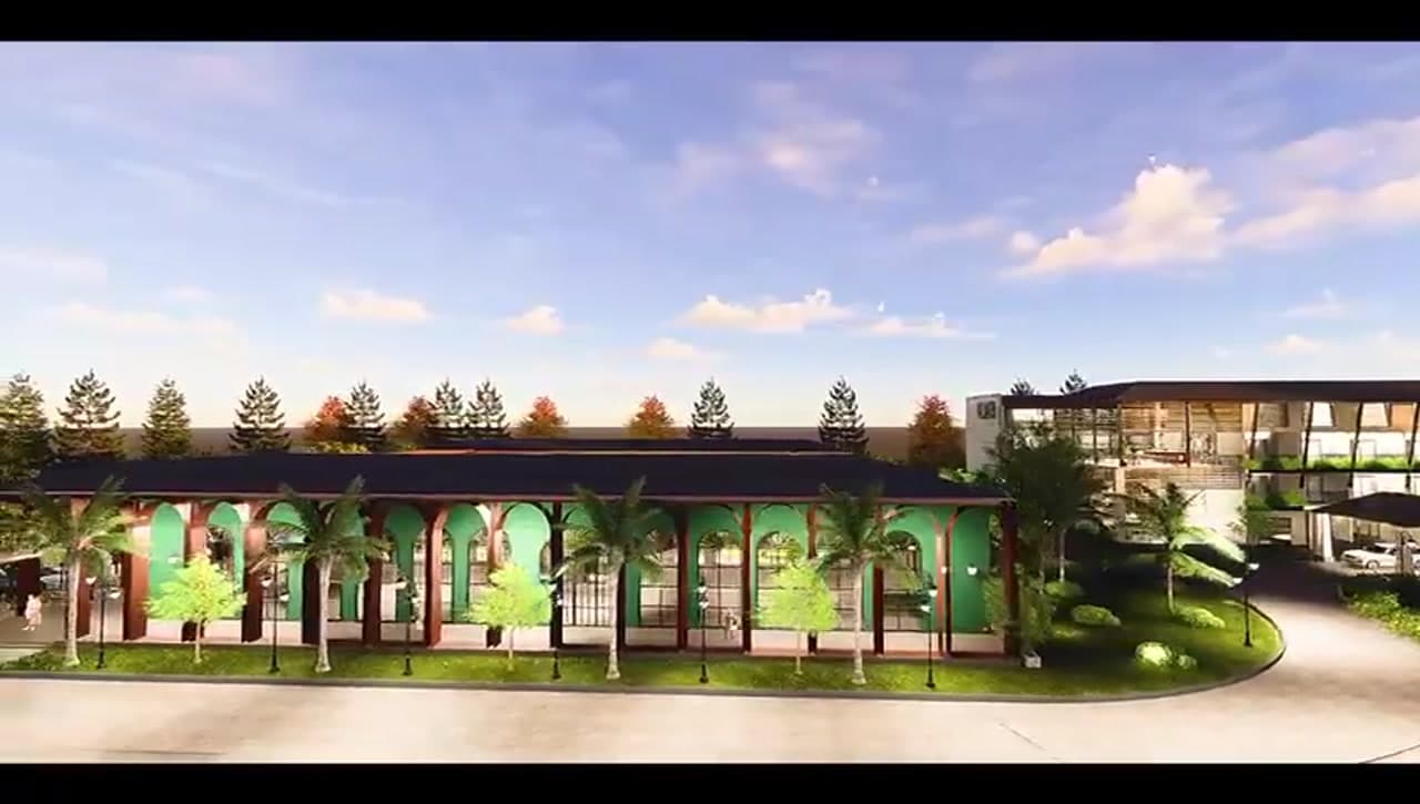 9,000 sq ft banquet hall with arched green facade and palm trees