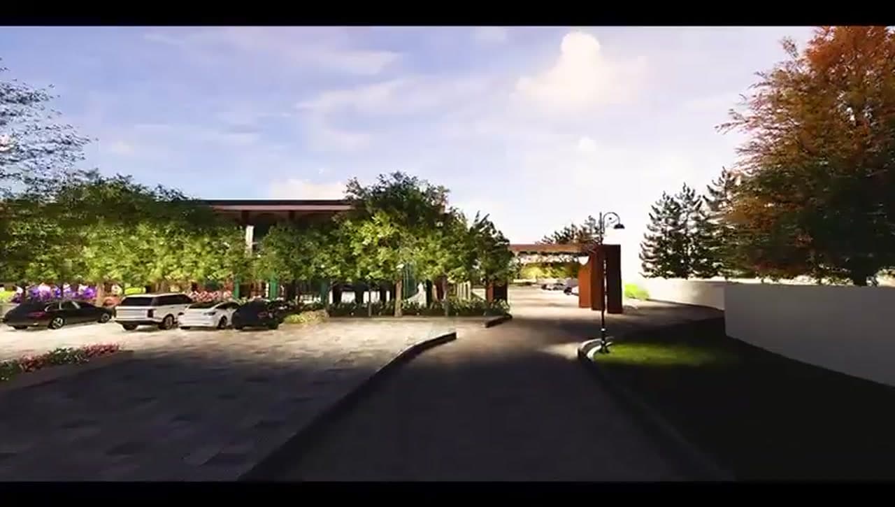Resort entrance approach with landscaped parking